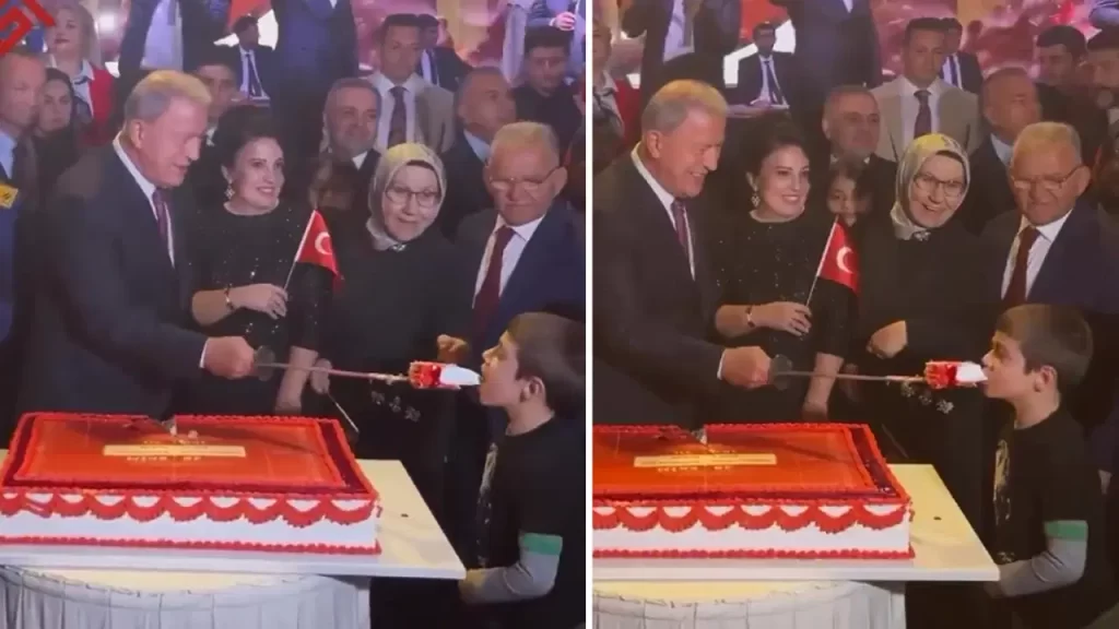 AKP’li Hulusi Akar, küçük çocuğa ‘kılıçla’ pasta yedirdi